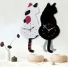 Nordic cat with wagging tail wall clock